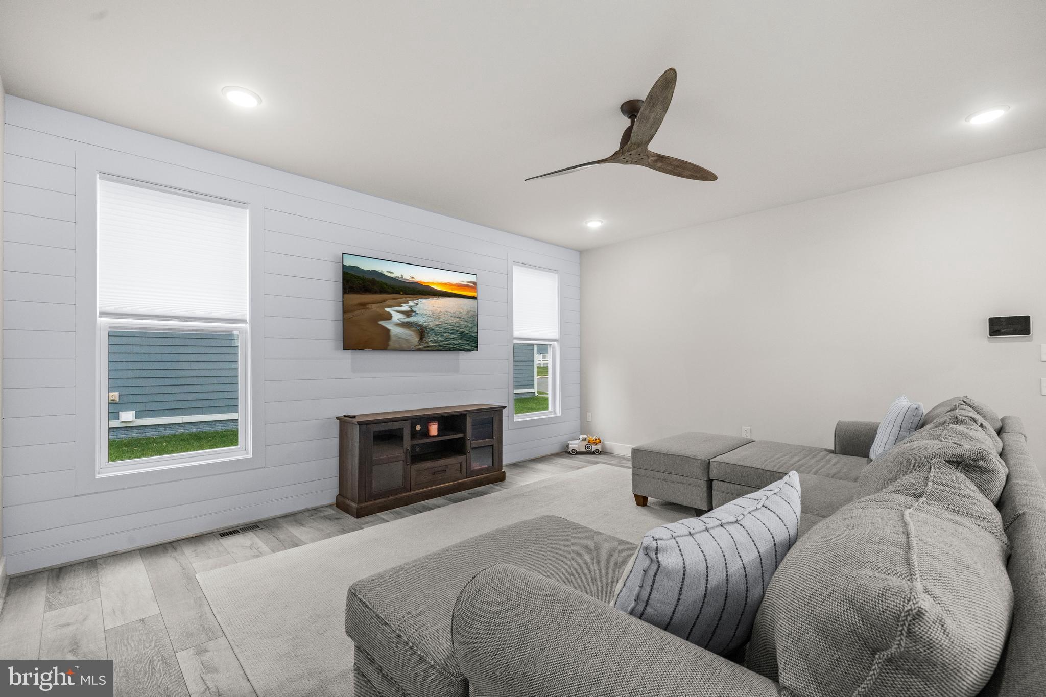 1814 River Heritage Boulevard Dumfries, VA 22026 - Photo 11 of 55 a bedroom with furniture and a fireplace