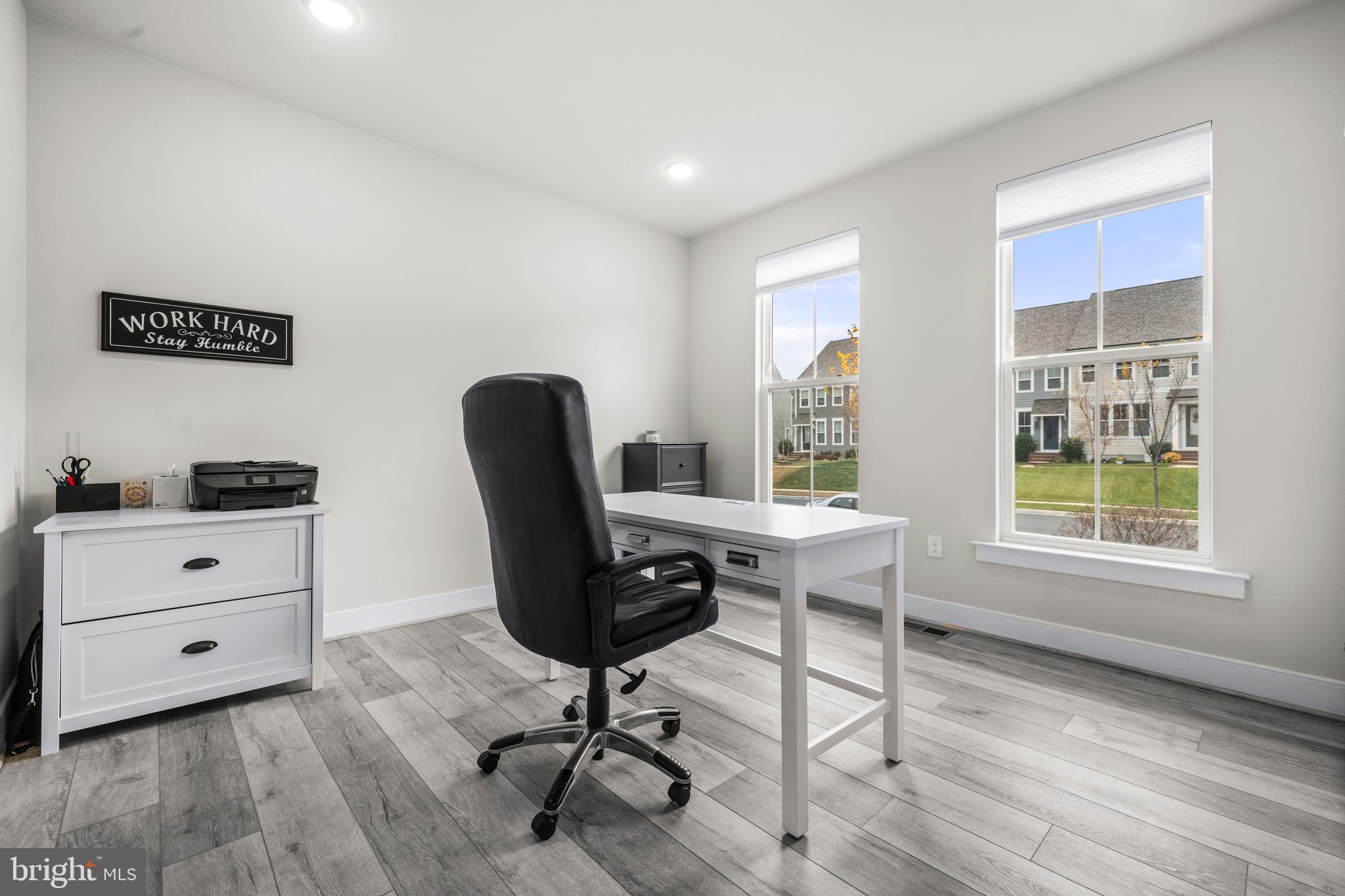 1814 River Heritage Boulevard Dumfries, VA 22026 - Photo 15 of 55 a view of a workspace with furniture and a window