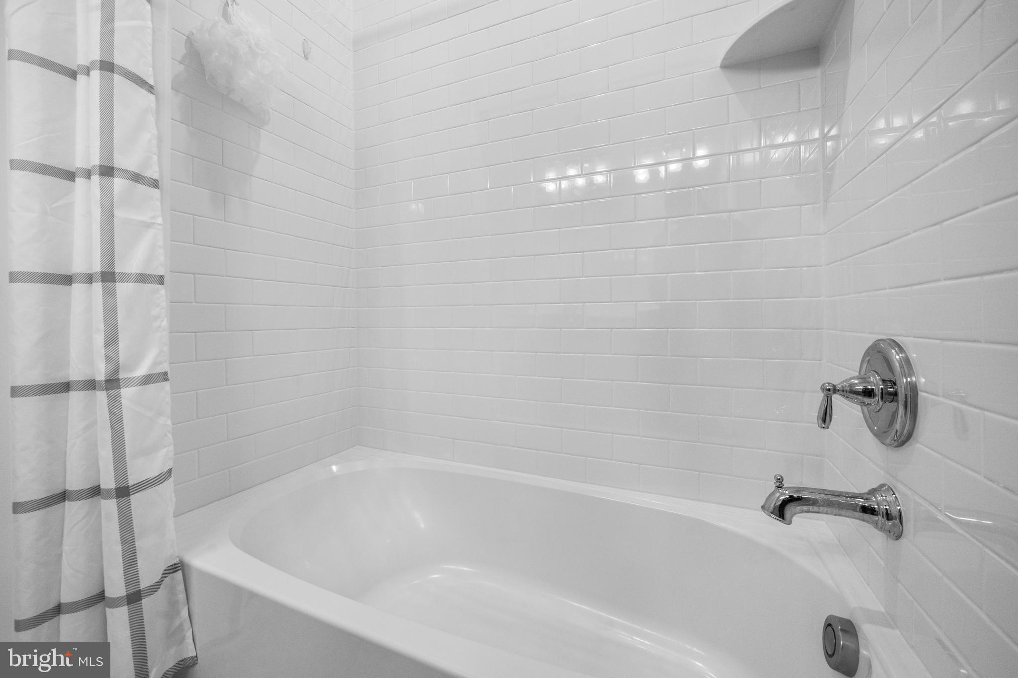 1814 River Heritage Boulevard Dumfries, VA 22026 - Photo 29 of 55 a close view of a bathtub in bathroom