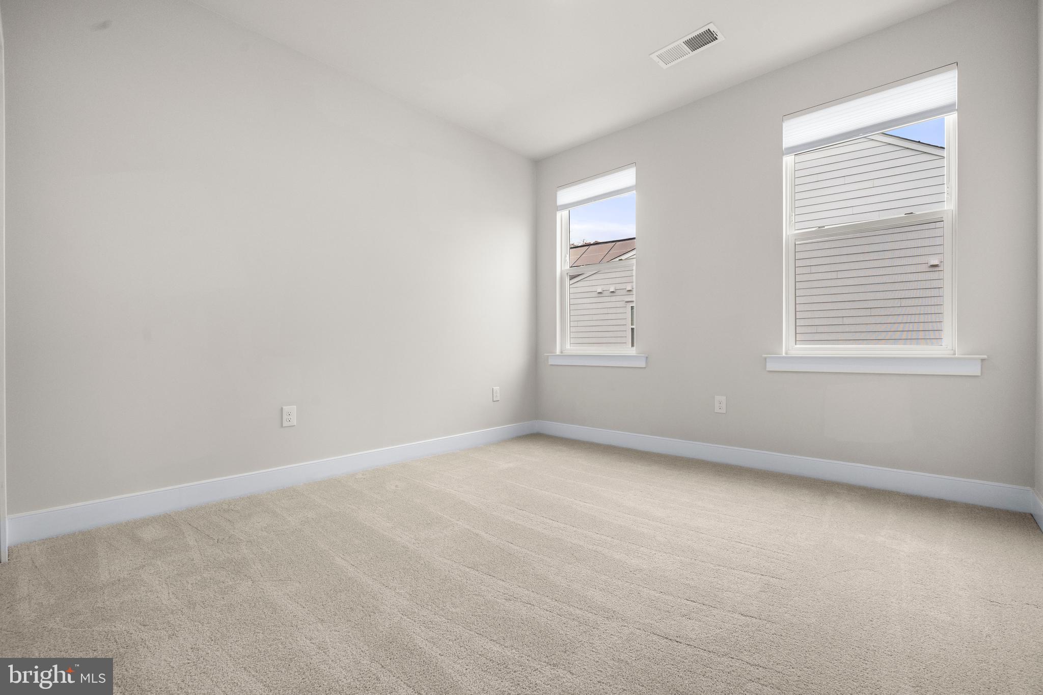 1814 River Heritage Boulevard Dumfries, VA 22026 - Photo 30 of 55 an empty room with windows