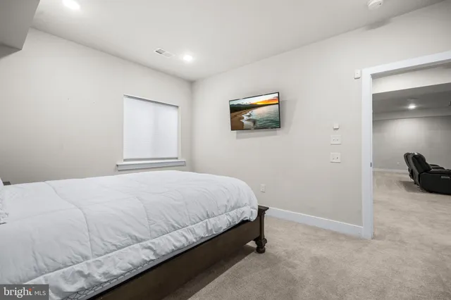 a view of a chair and table in the patio with a yard