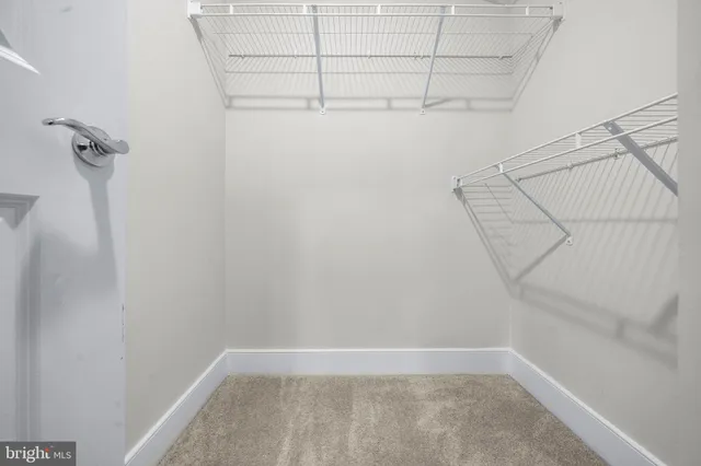 a view of house with backyard