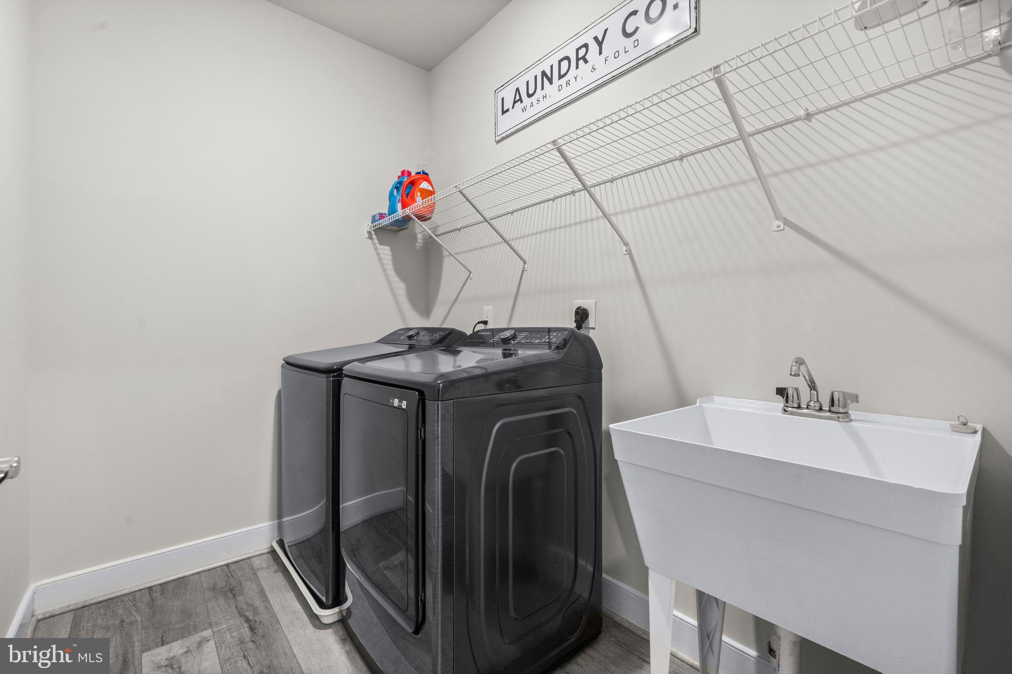 1814 River Heritage Boulevard Dumfries, VA 22026 - Photo 38 of 55 a utility room with dryer and washer