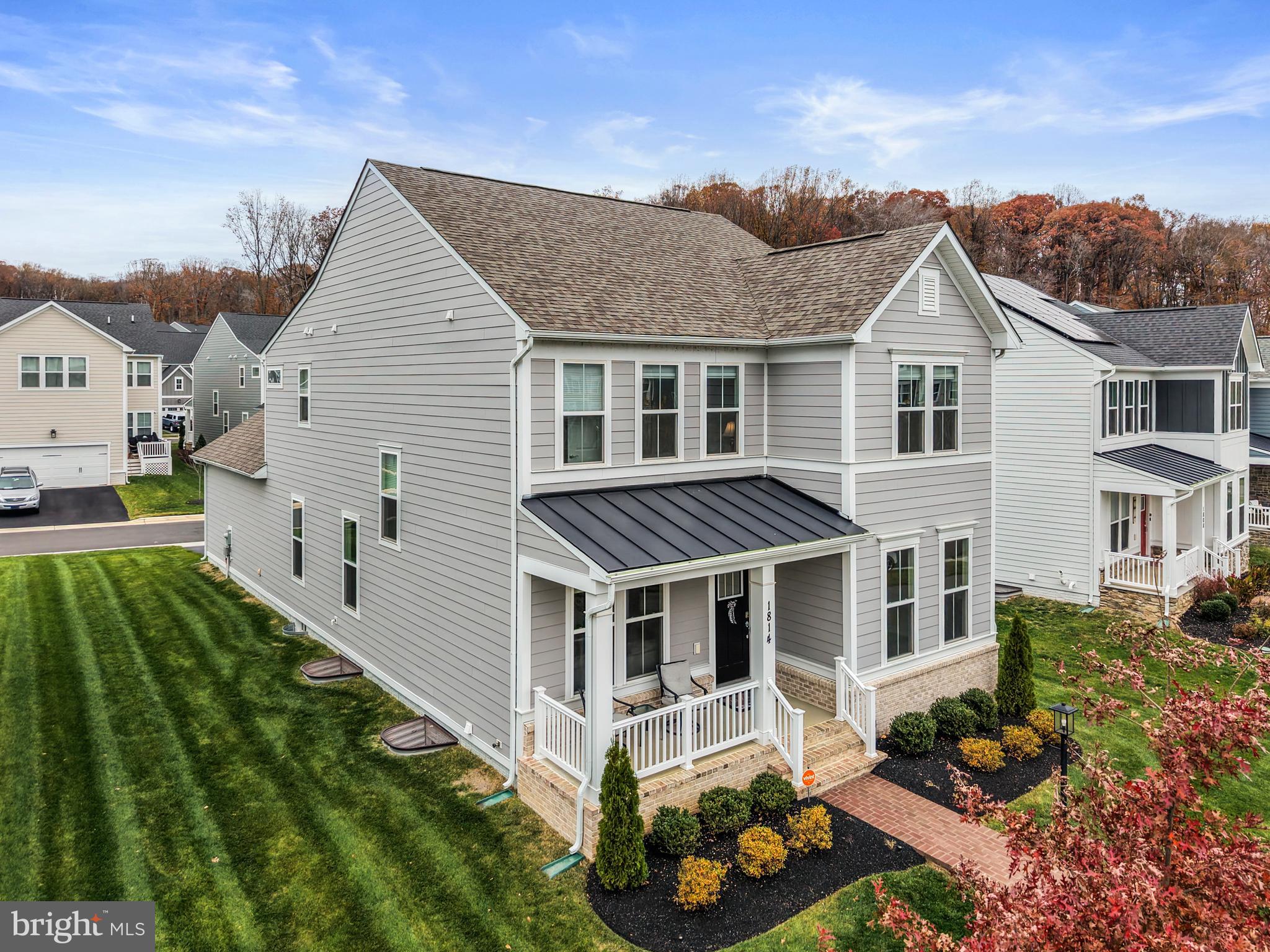 1814 River Heritage Boulevard Dumfries, VA 22026 - Photo 43 of 55 a aerial view of a house with yard and porch