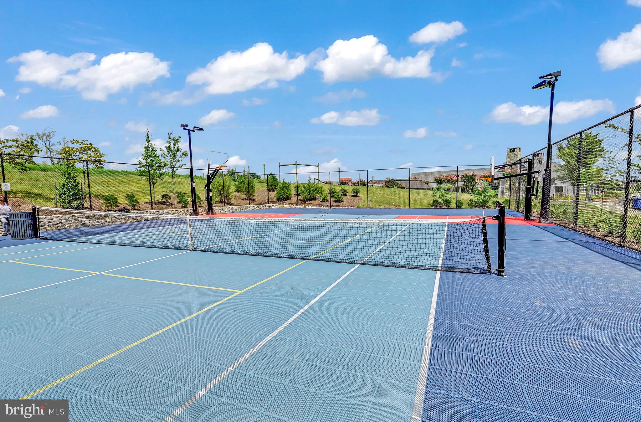 1814 River Heritage Boulevard Dumfries, VA 22026 - Photo 49 of 55 a view of an outdoor space and tennis court