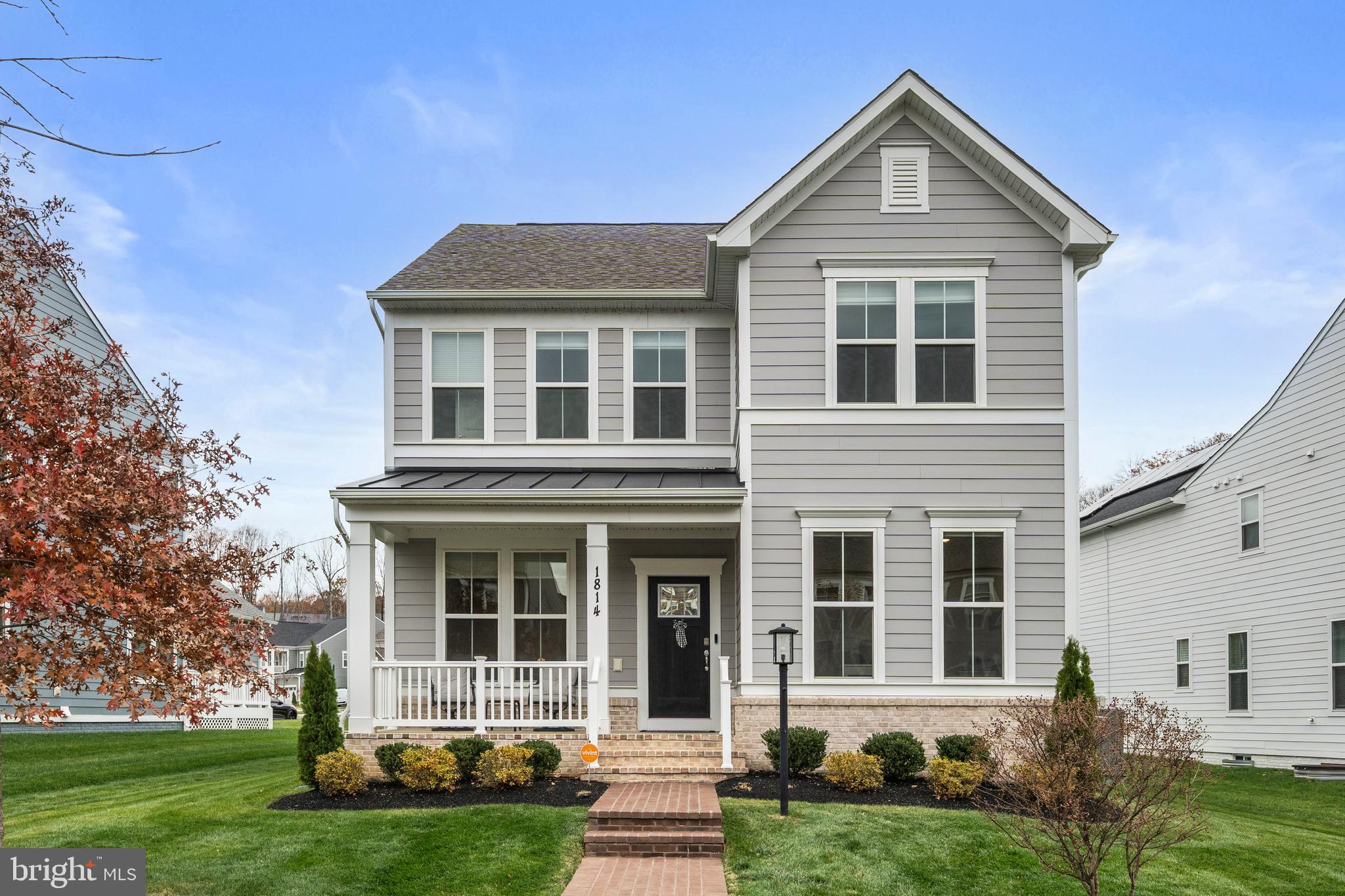 1814 River Heritage Boulevard Dumfries, VA 22026 - Photo 50 of 55 front view of a house with a yard