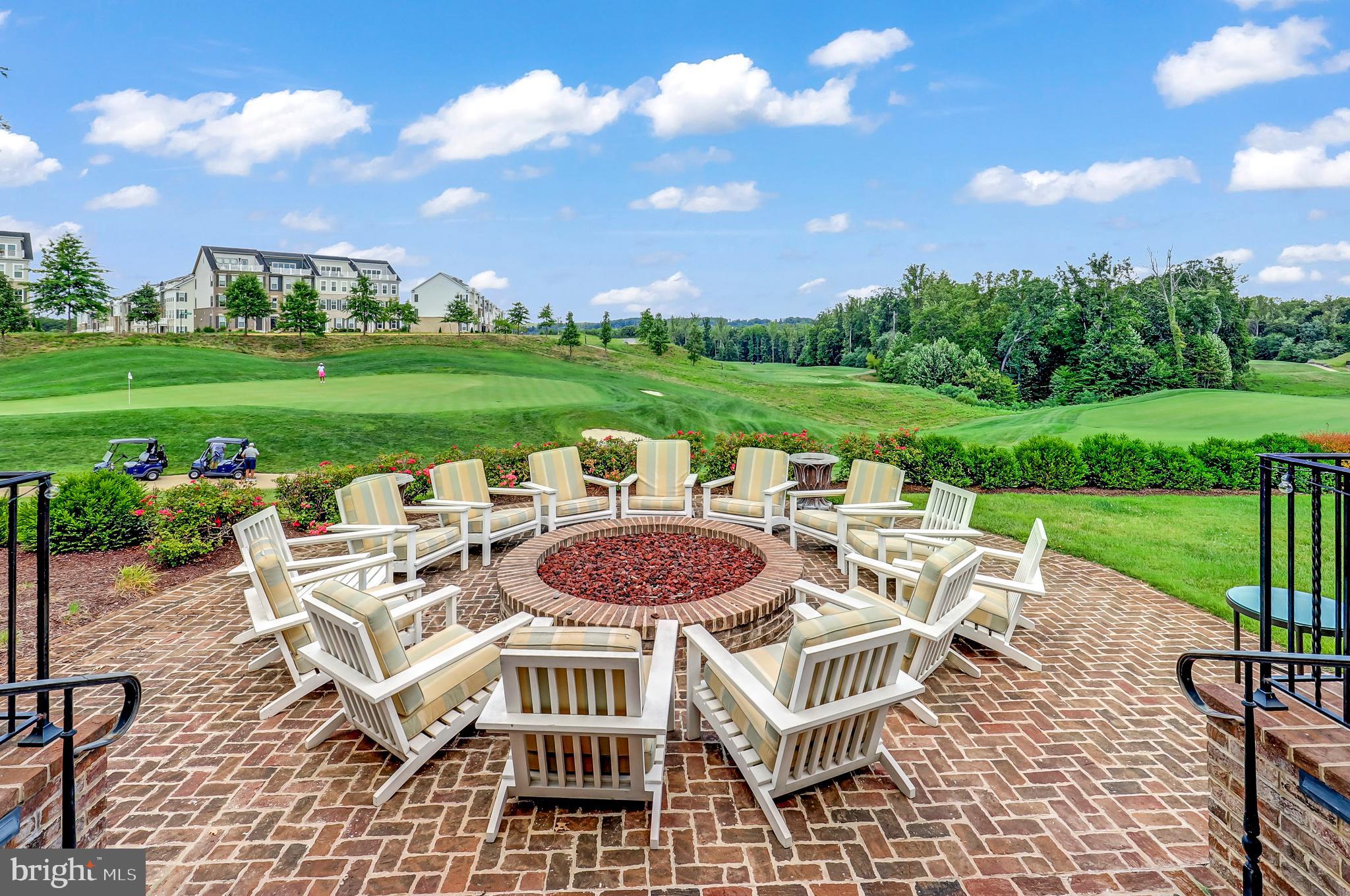 1814 River Heritage Boulevard Dumfries, VA 22026 - Photo 53 of 55 a view of a patio with table and chairs and a yard