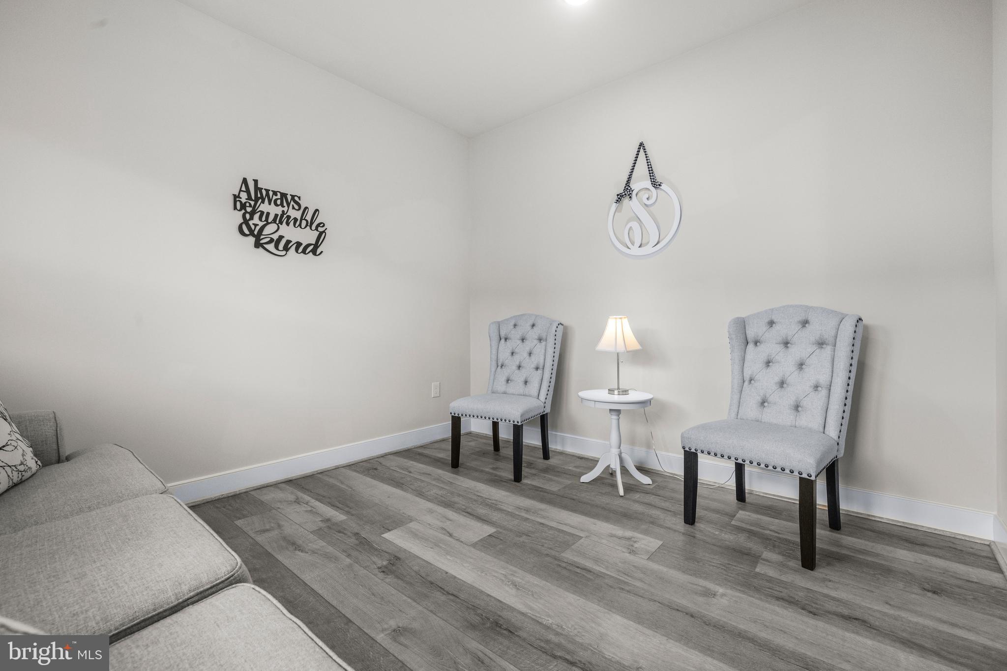 1814 River Heritage Boulevard Dumfries, VA 22026 - Photo 8 of 55 a view of a room with furniture and wooden floor