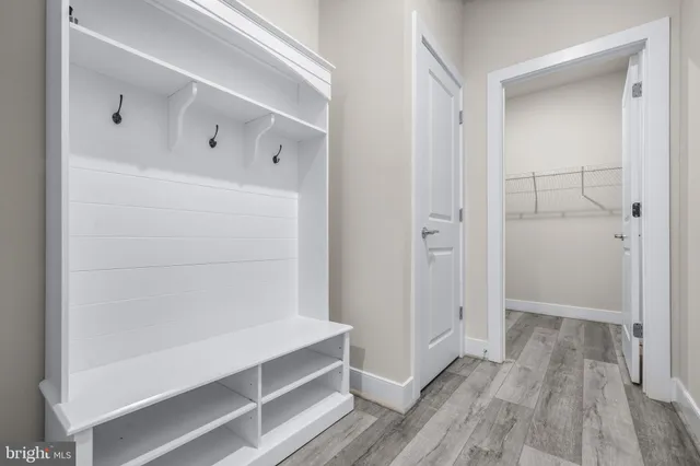 a bedroom with furniture and a fireplace