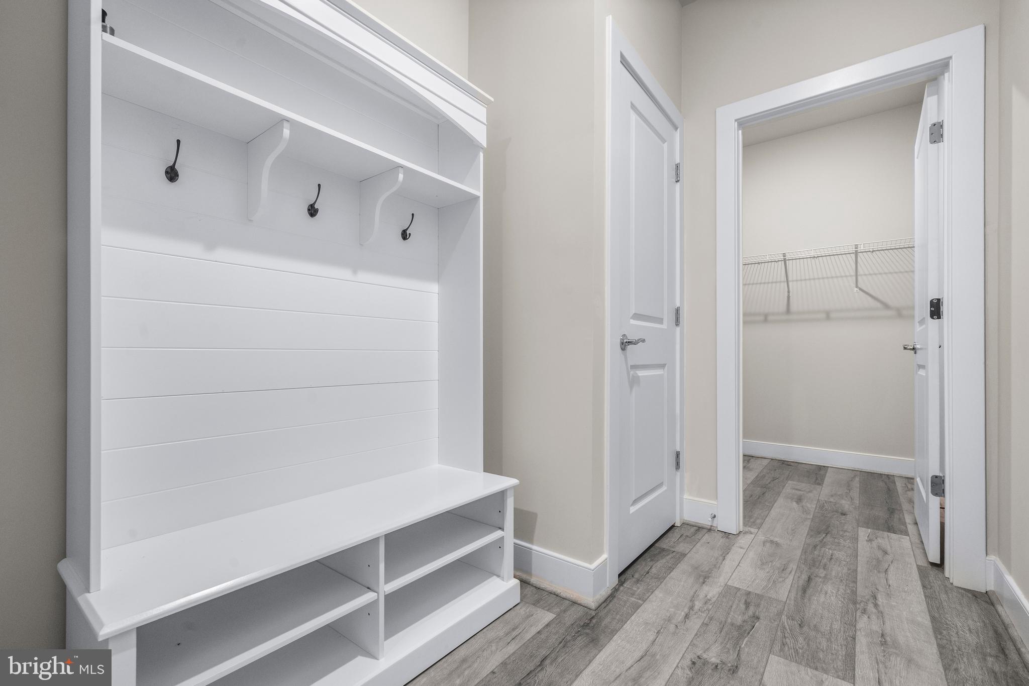 1814 River Heritage Boulevard Dumfries, VA 22026 - Photo 9 of 55 a view of walk in closet with wooden floor