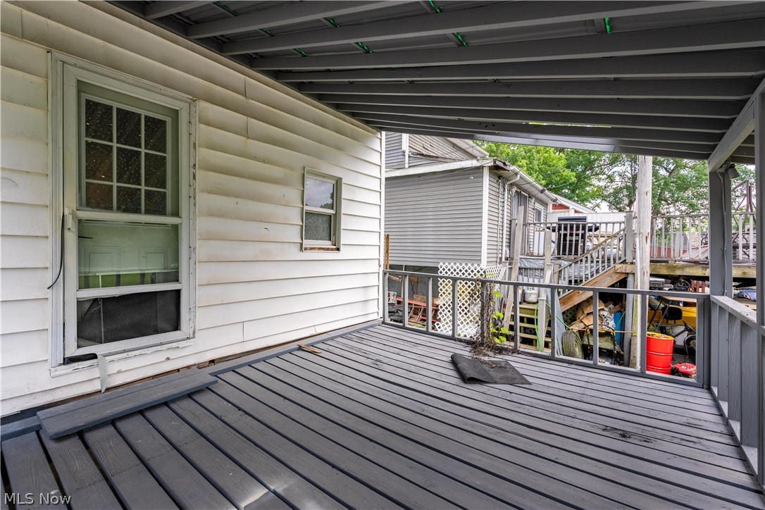 8177 South Cleveland Massillon Road, Unit 55 Clinton, OH 44216 - Photo 22 of 35 Back coverd porch
