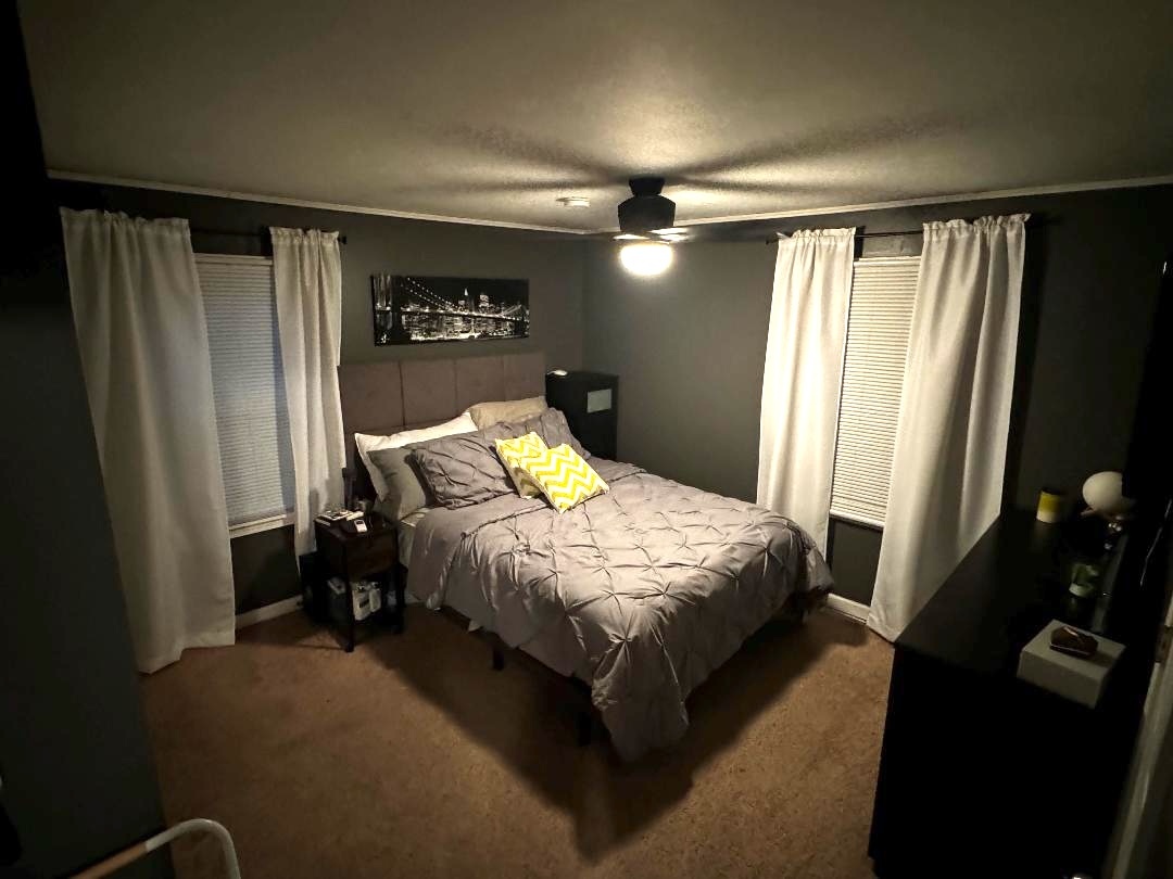 11 Cross Street Bristol, IL 60512 - Photo 8 of 11 a bed sitting in a bedroom next to a window