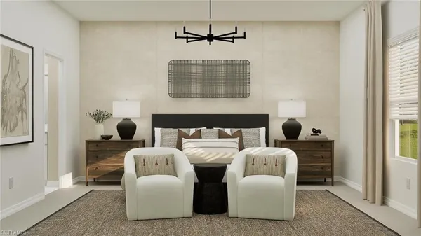a living room with furniture a window and a ceiling fan