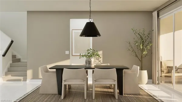 a dining room with furniture and wooden floor