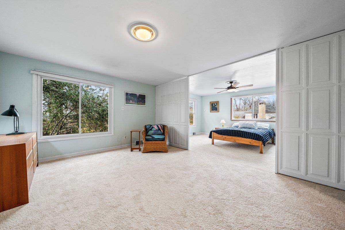 353 Colonial Road Memphis, TN 38117 - Photo 24 of 37 Bedroom featuring light colored carpet and ceiling fan