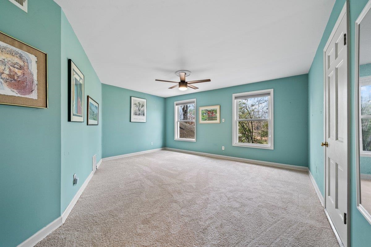 353 Colonial Road Memphis, TN 38117 - Photo 26 of 37 Unfurnished room featuring ceiling fan and light colored carpet