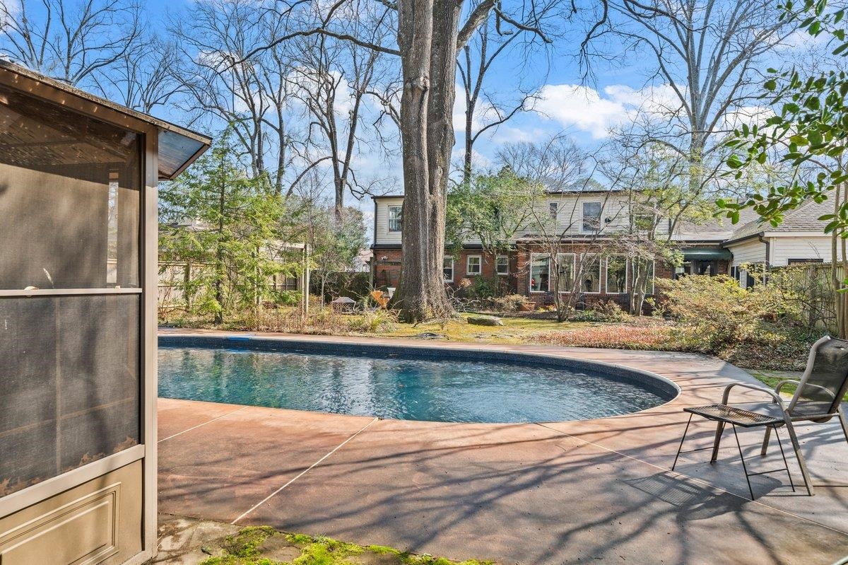 353 Colonial Road Memphis, TN 38117 - Photo 27 of 37 Swimming pool with a patio area