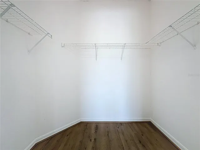 a view of a room with racks on the wall