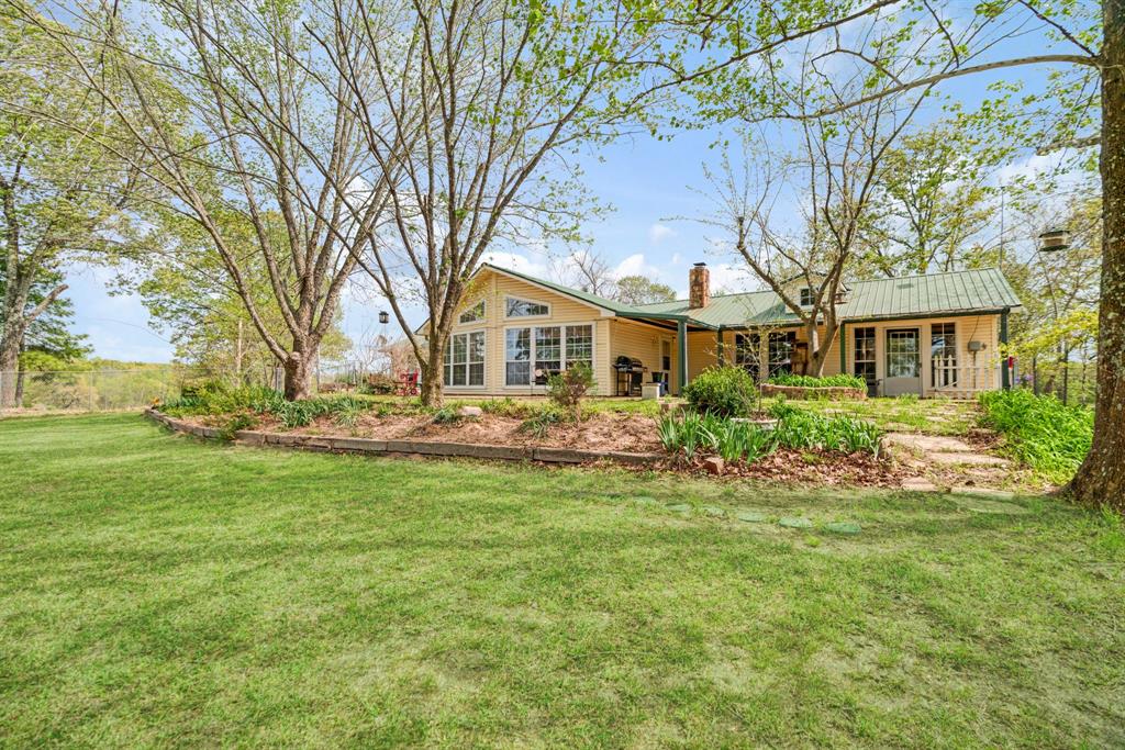 3178 East 2150 Road Grant, OK 74738 - Photo 1 of 40 a front view of a house with a yard