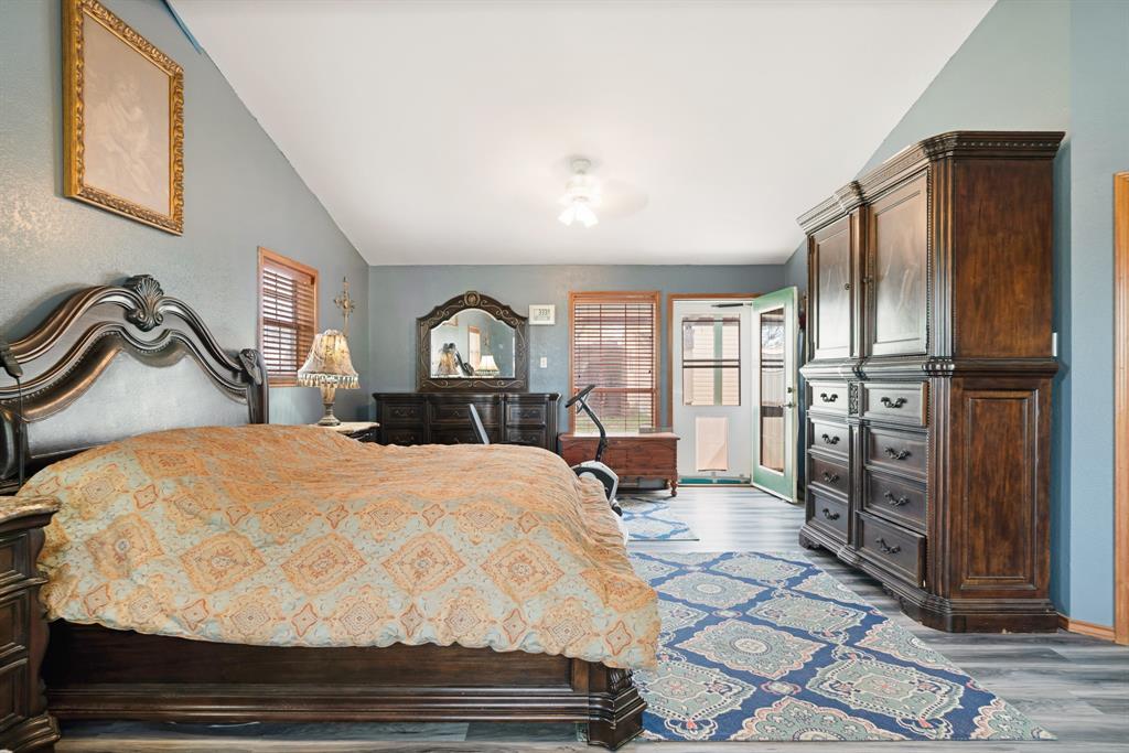 3178 East 2150 Road Grant, OK 74738 - Photo 11 of 40 a bedroom with a bed dresser and a large window