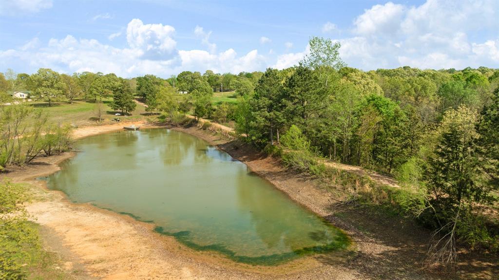 3178 East 2150 Road Grant, OK 74738 - Photo 35 of 40 a view of a lake with houses in the background