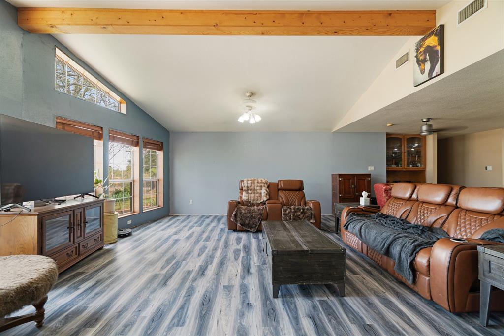 3178 East 2150 Road Grant, OK 74738 - Photo 4 of 40 a living room with furniture and a flat screen tv
