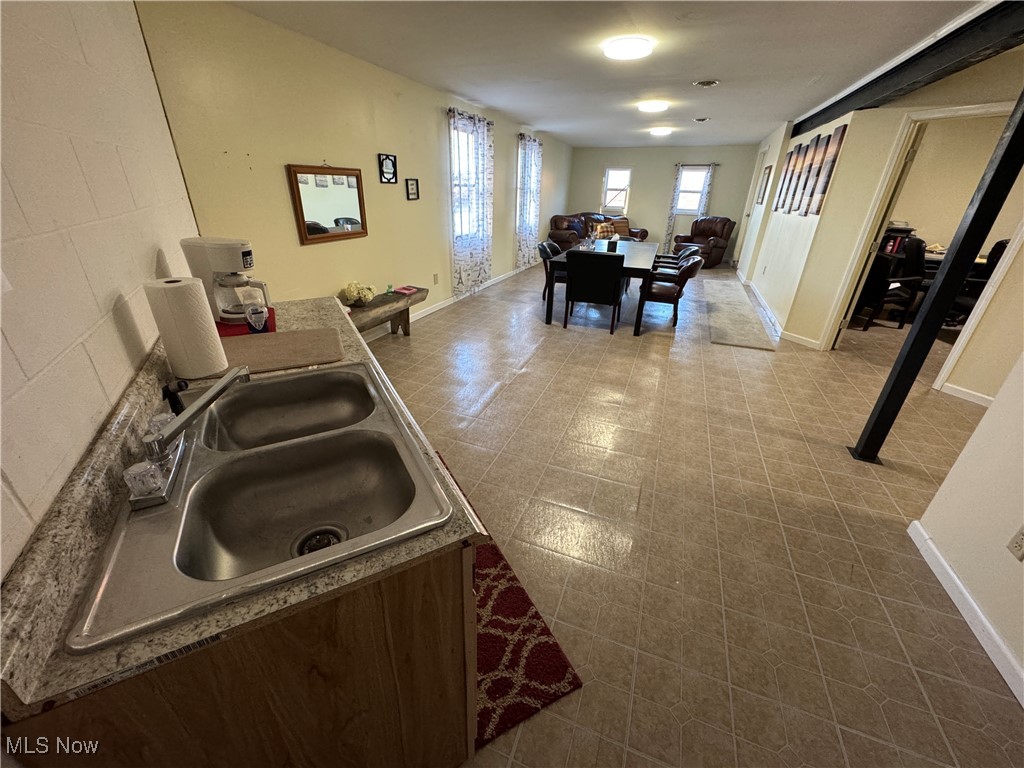 152 East Main Street Barnesville, OH 43713 - Photo 48 of 48 Kitchen with open floor plan and tile patterned floors
