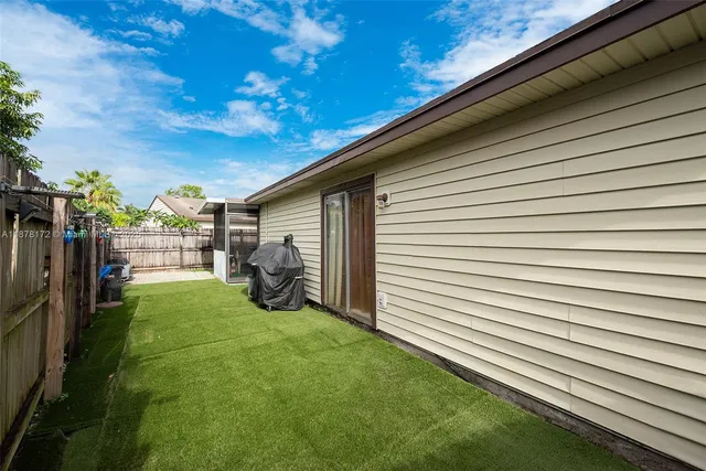 a view of a back yard of the house