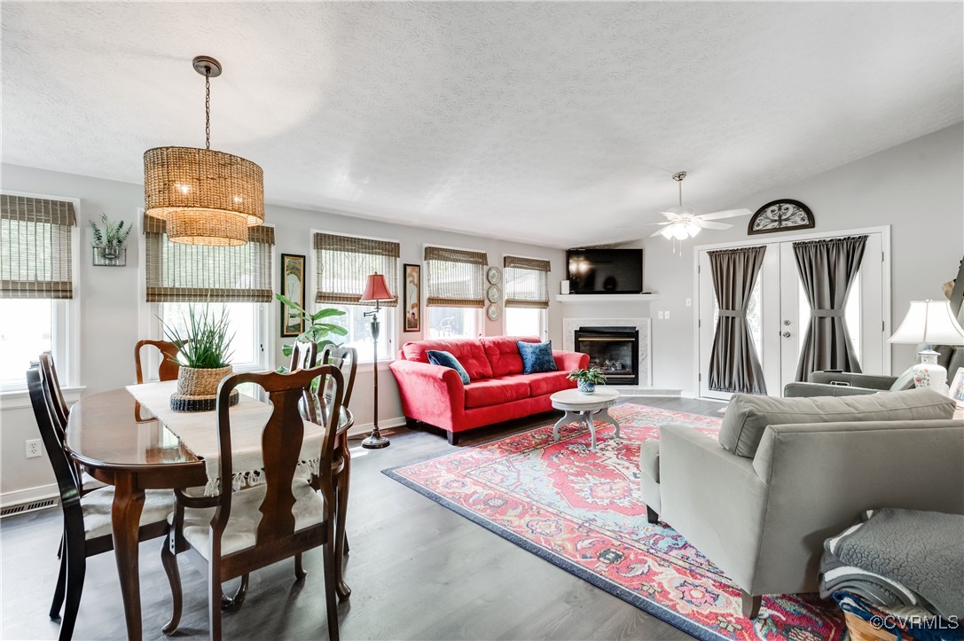 7111 Ledo Road Moseley, VA 23120 - Photo 21 of 47 a living room with furniture and a chandelier