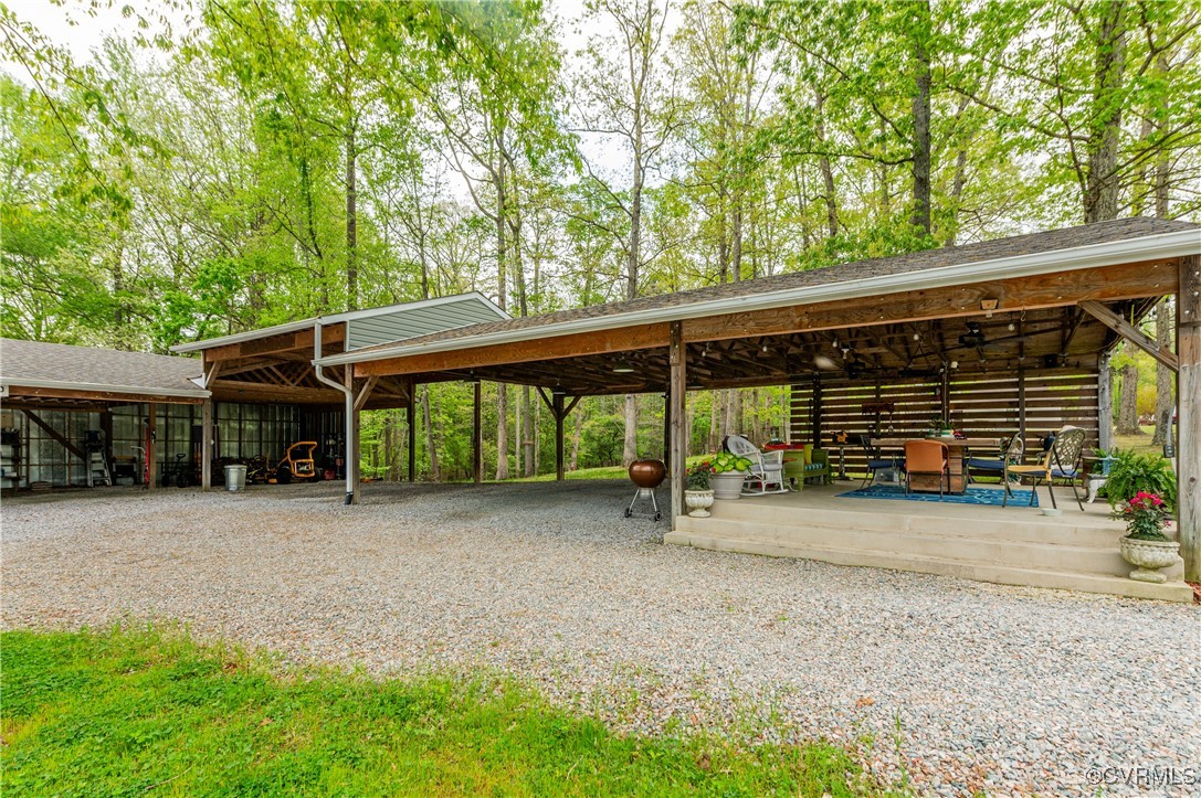 7111 Ledo Road Moseley, VA 23120 - Photo 32 of 47 a view of a house with a backyard and balcony