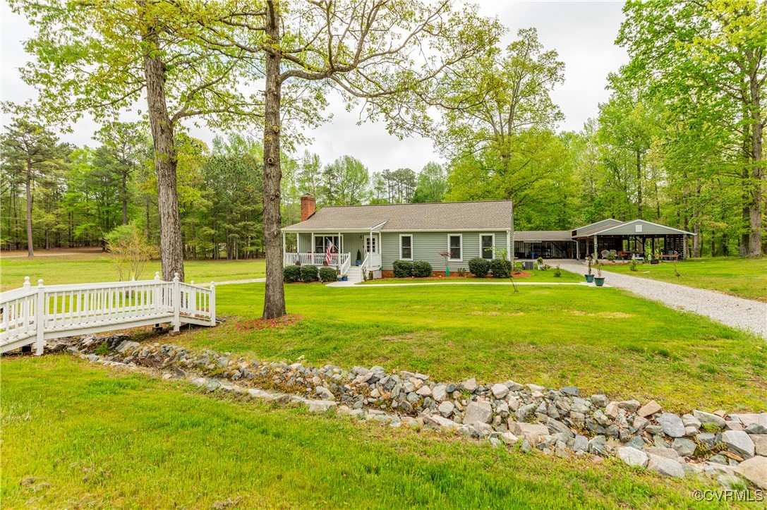 7111 Ledo Road Moseley, VA 23120 - Photo 43 of 47 a view of a house with a yard