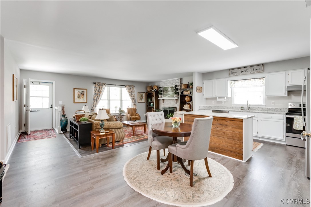 7111 Ledo Road Moseley, VA 23120 - Photo 7 of 47 a living room with furniture and wooden floor