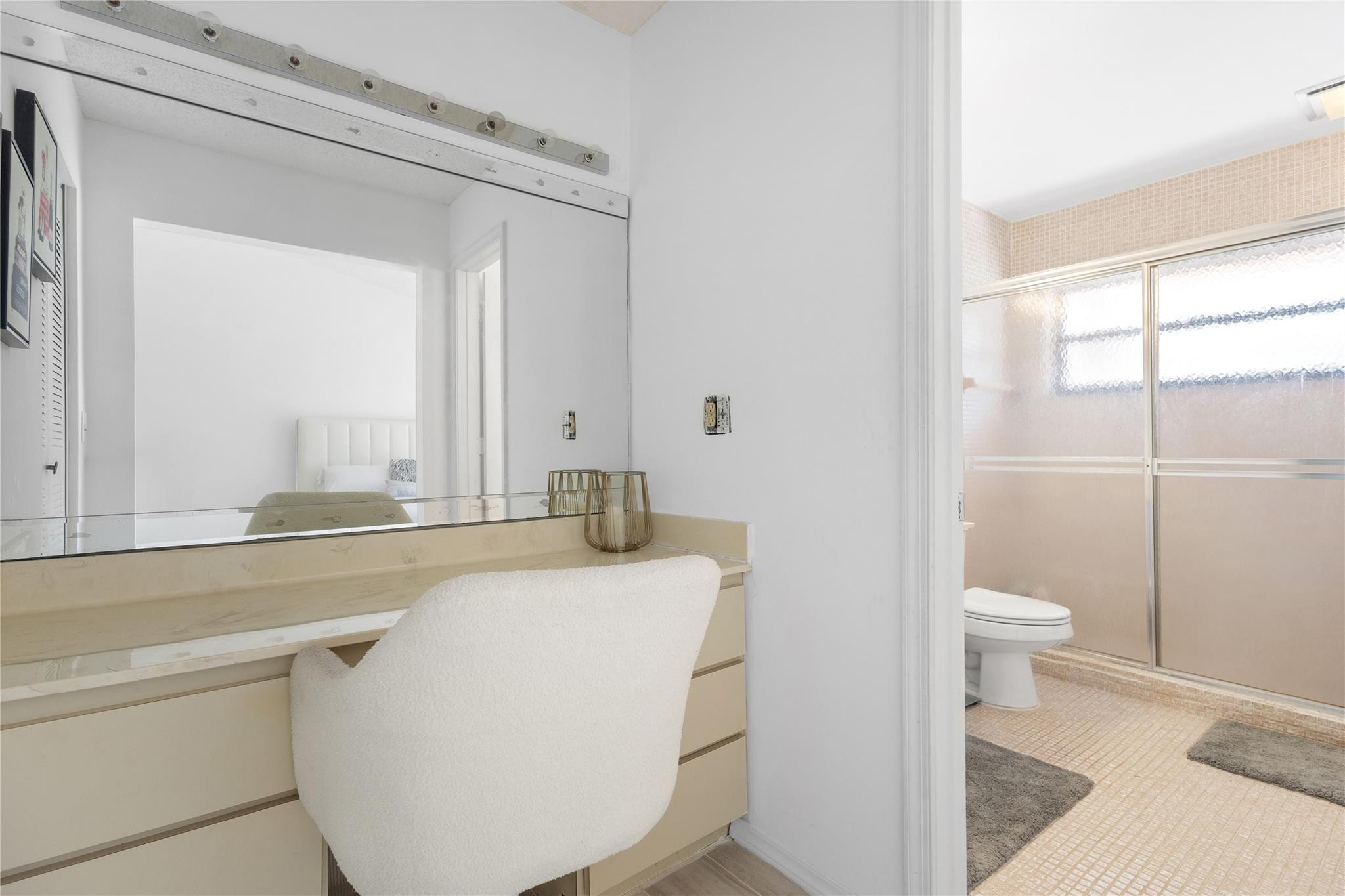 9477 Burlington Place Boca Raton, FL 33434 - Photo 16 of 40 a bathroom with a granite countertop sink mirror vanity and toilet