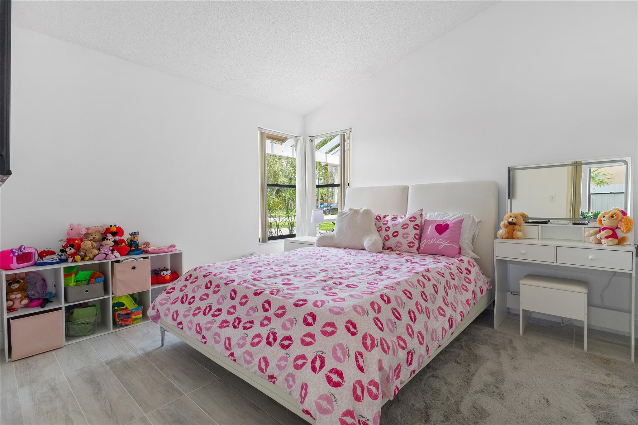 9477 Burlington Place Boca Raton, FL 33434 - Photo 17 of 40 a bedroom with a bed and a window