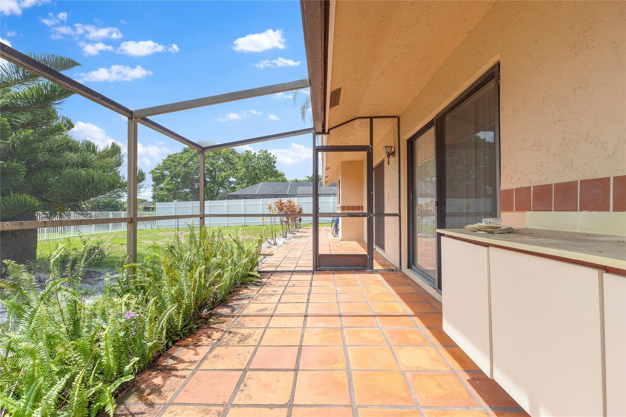 9477 Burlington Place Boca Raton, FL 33434 - Photo 21 of 40 a view of a pathway with a balcony