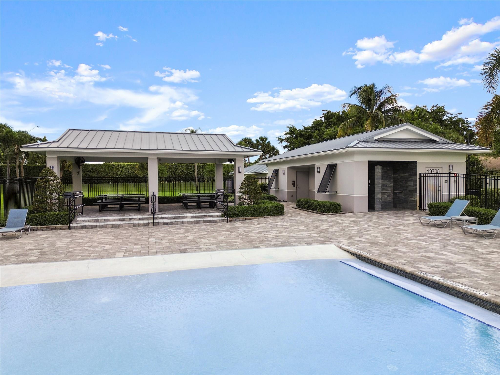 9477 Burlington Place Boca Raton, FL 33434 - Photo 26 of 40 a view of a house with a yard and porch