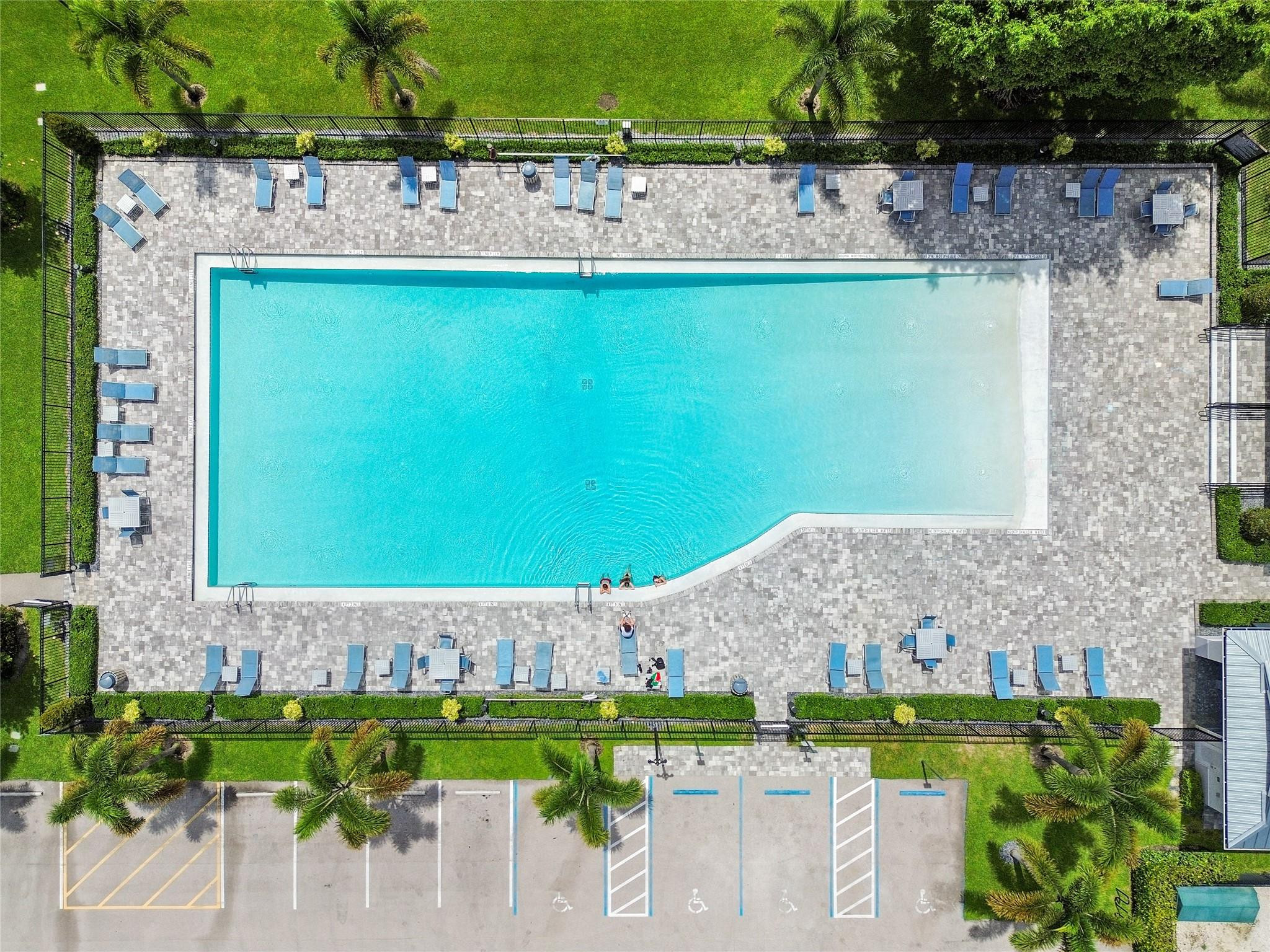 9477 Burlington Place Boca Raton, FL 33434 - Photo 27 of 40 a view of swimming pool with a yard and outdoor seating