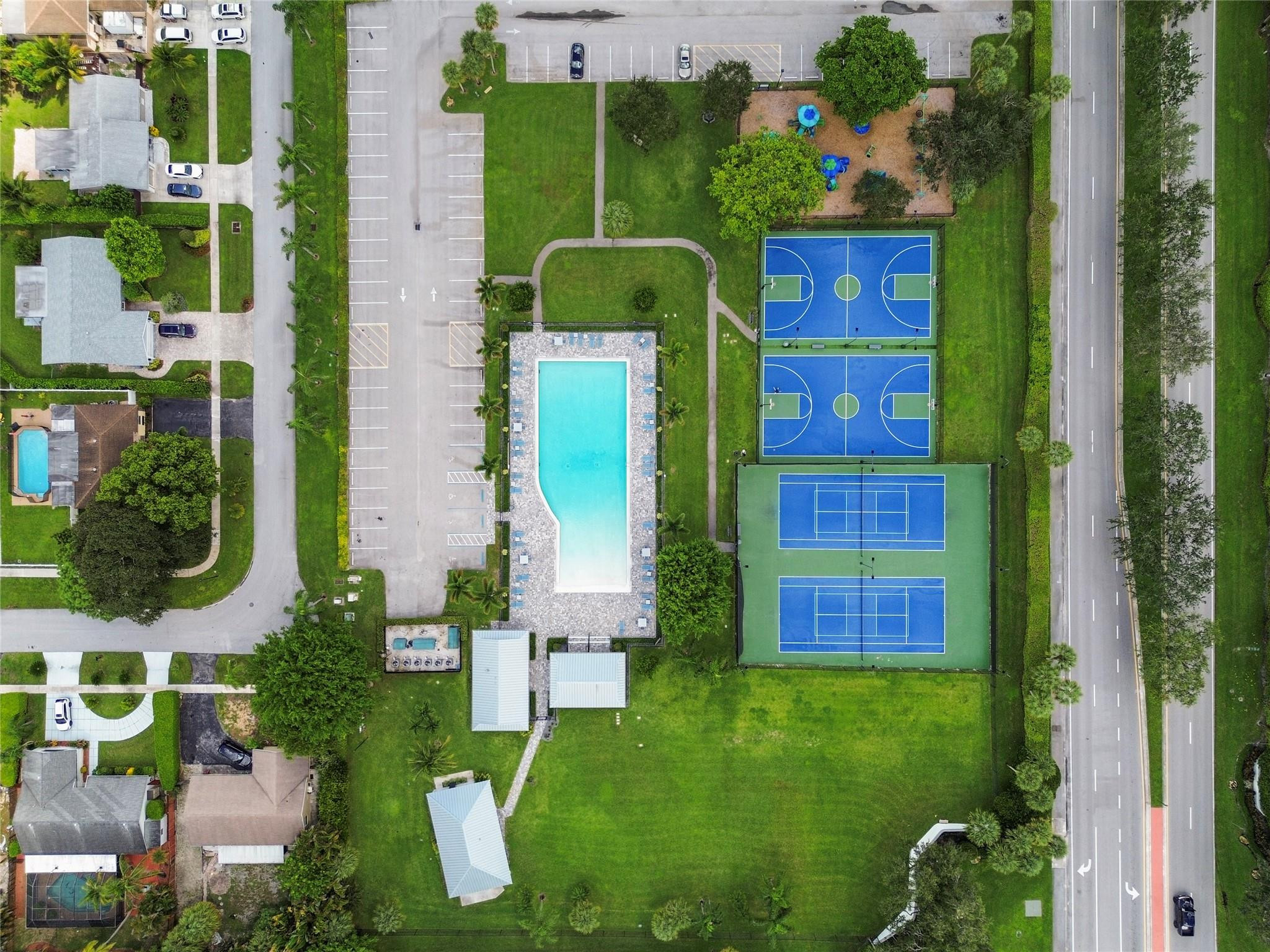 9477 Burlington Place Boca Raton, FL 33434 - Photo 28 of 40 front view of a house with a garden