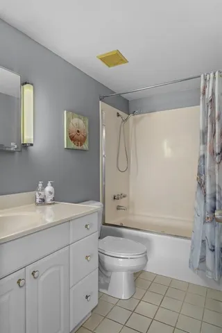 a living room with furniture and a gate