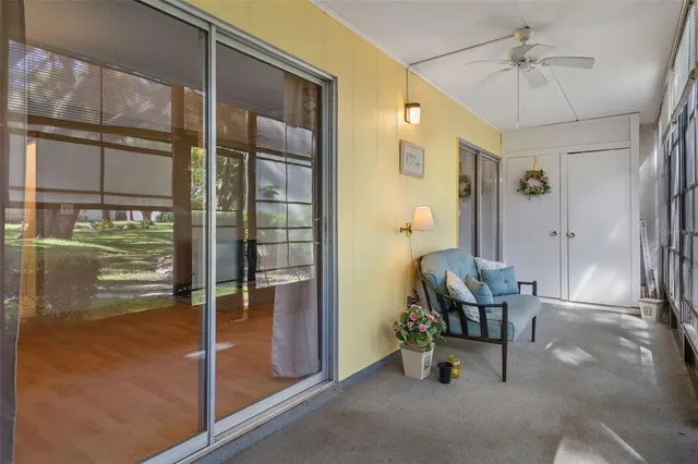 a flower plants sitting in front of a house