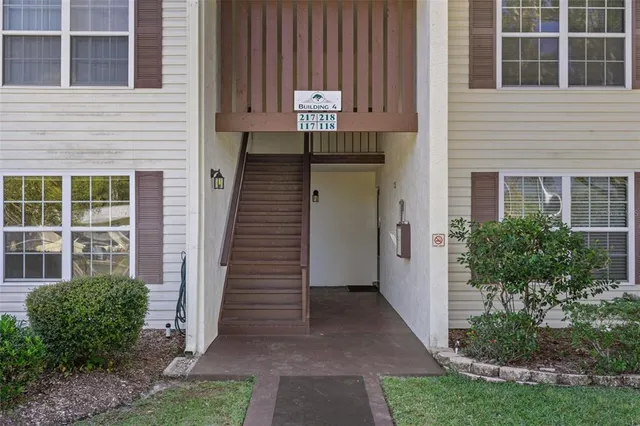 a view of a house with entryway and stairs