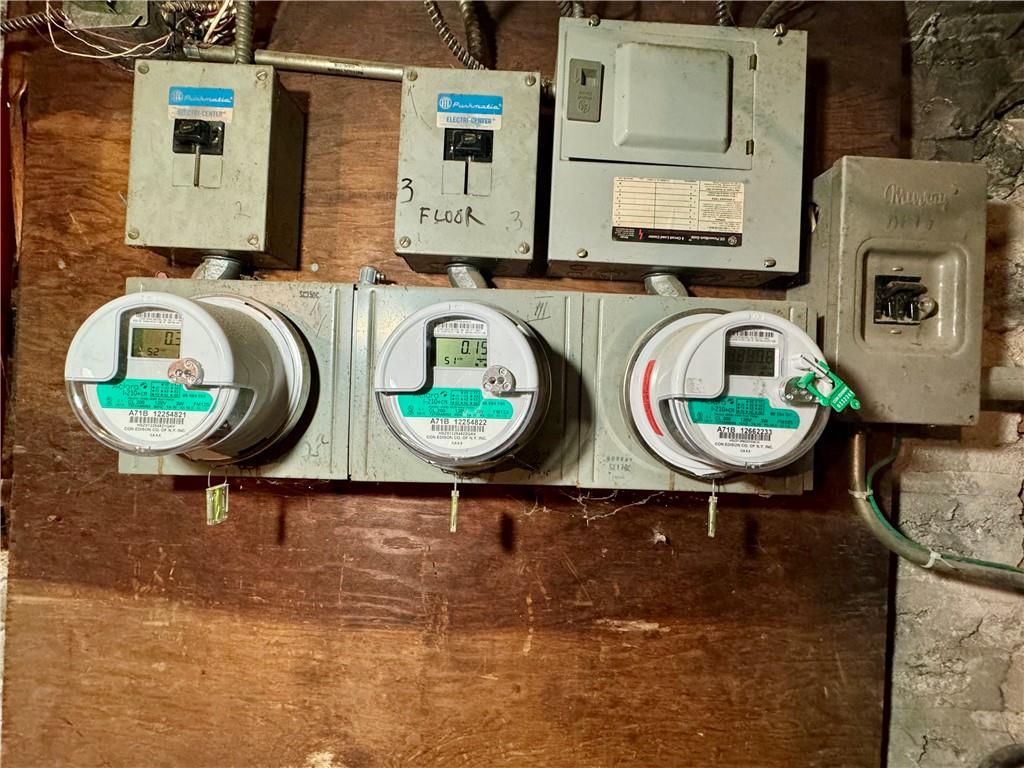 6119 4th Avenue Brooklyn, NY 11220 - Photo 4 of 9 a kitchen with stainless steel appliances granite countertop a sink and a stove