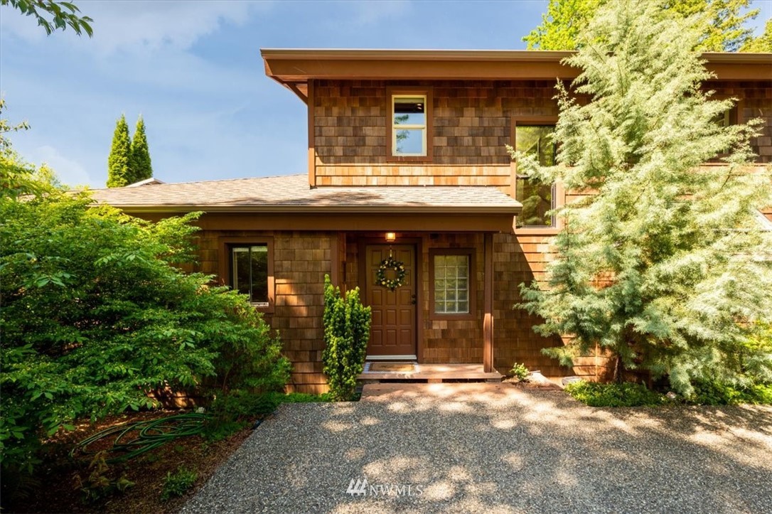 4214 Linnell Road Deming, WA 98244 - Photo 2 of 40 a front view of a house with garden