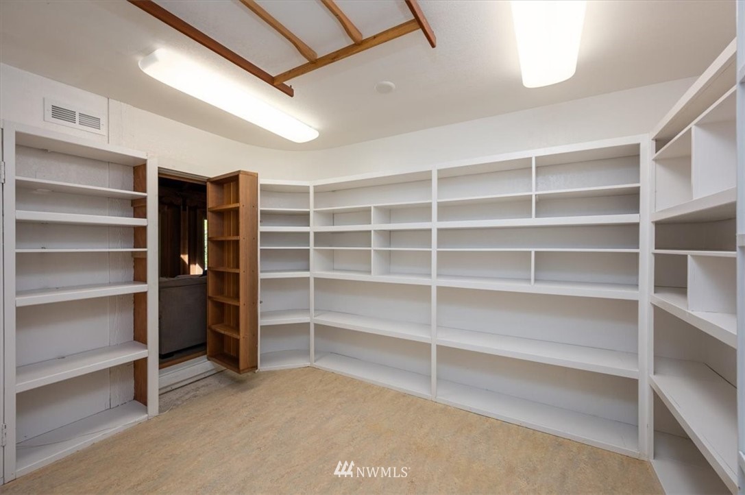 4214 Linnell Road Deming, WA 98244 - Photo 27 of 40 a view of an empty room with a furniture and closet