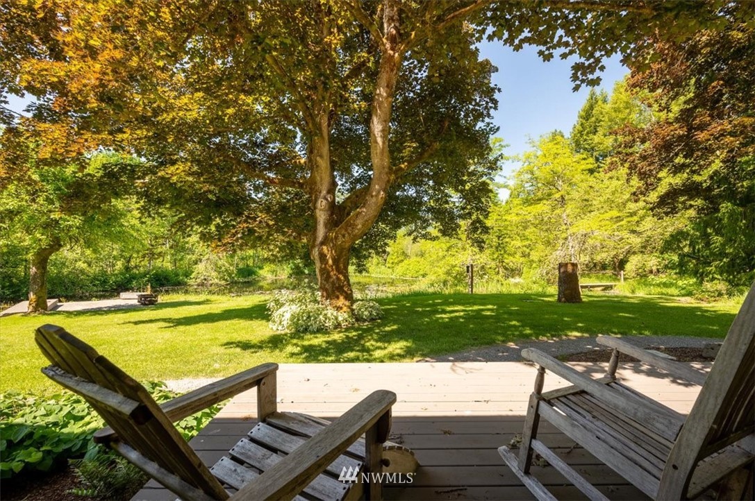 4214 Linnell Road Deming, WA 98244 - Photo 6 of 40 a view of a patio with chairs and a table