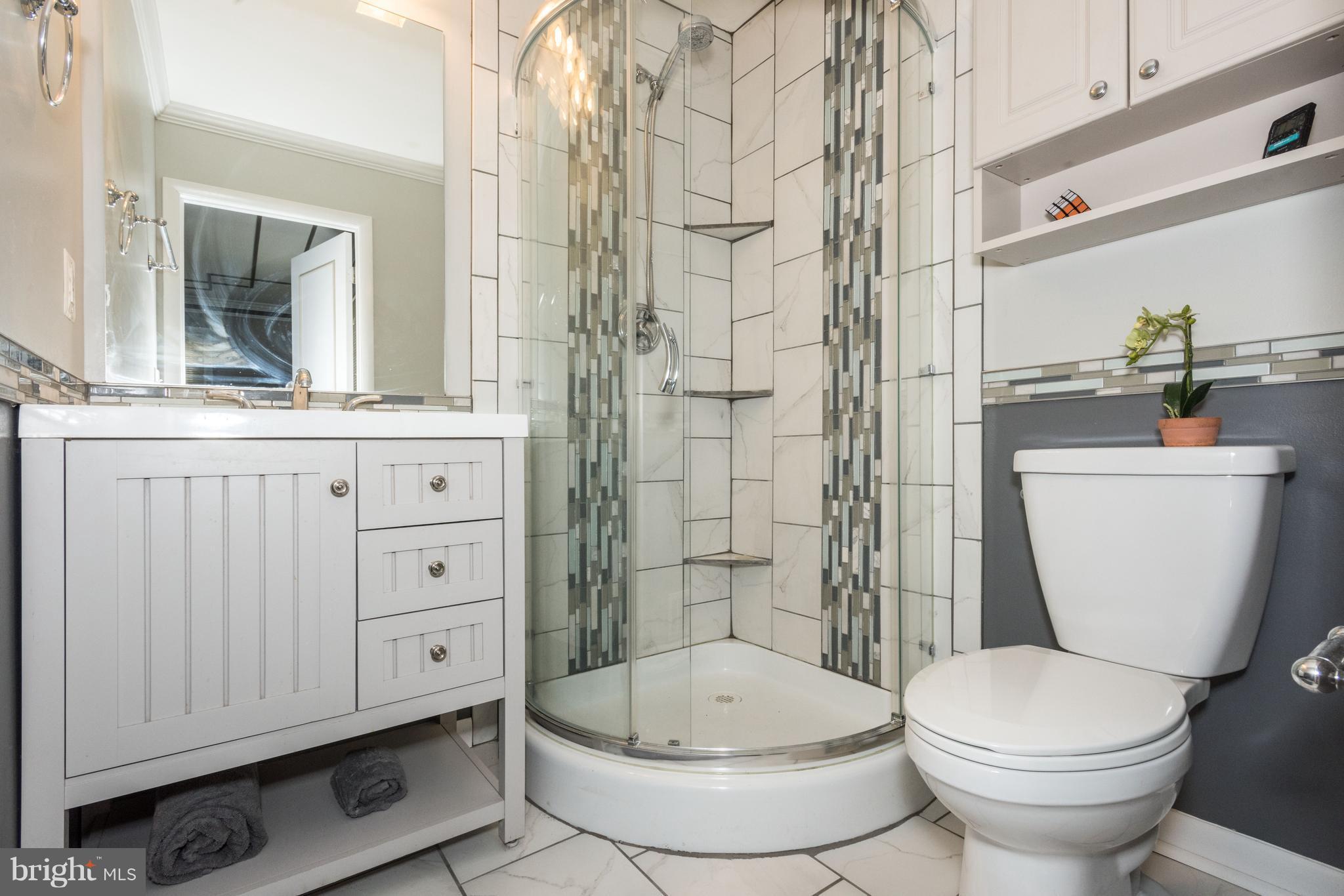30 North Rolling Road Baltimore, MD 21228 - Photo 11 of 30 Updated master bath with upgraded tile!