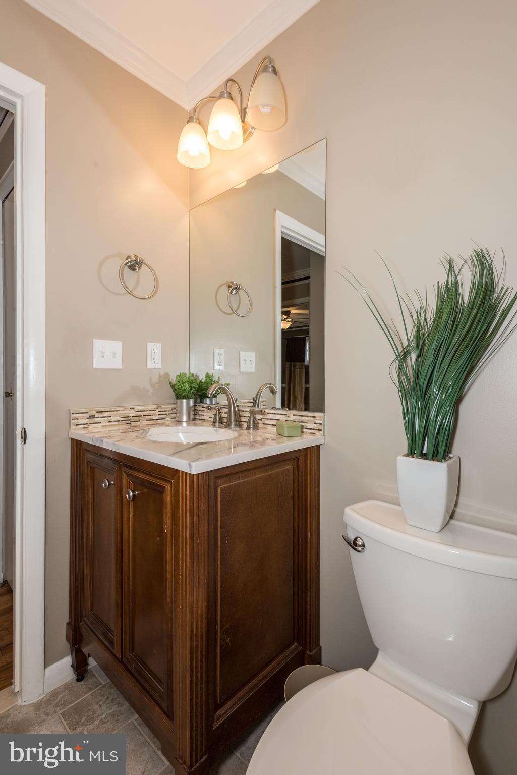 30 North Rolling Road Baltimore, MD 21228 - Photo 16 of 30 Updated vanity and tiolet!
