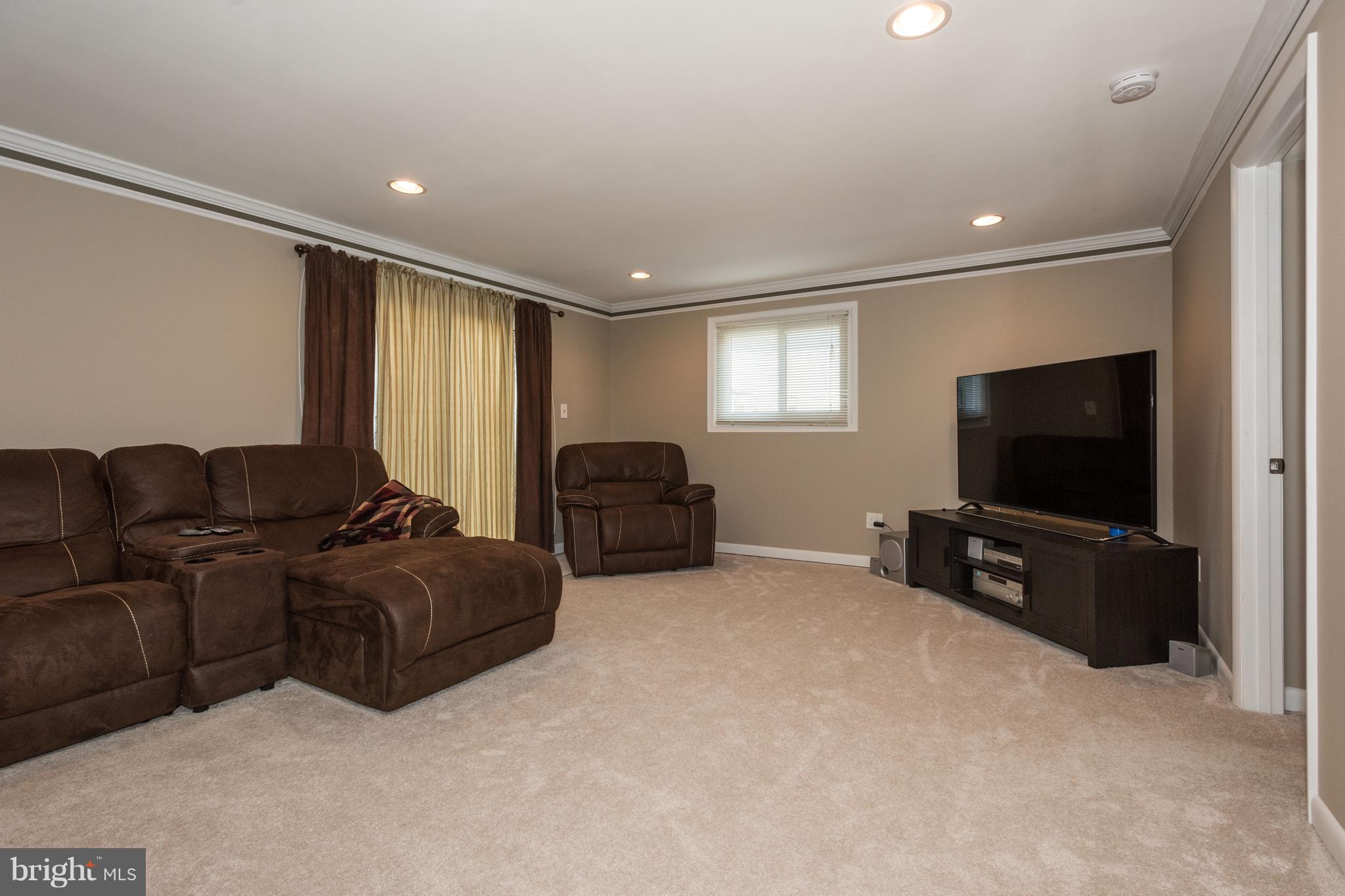 30 North Rolling Road Baltimore, MD 21228 - Photo 19 of 30 Family Room w/walk-out to fenced rear yard!