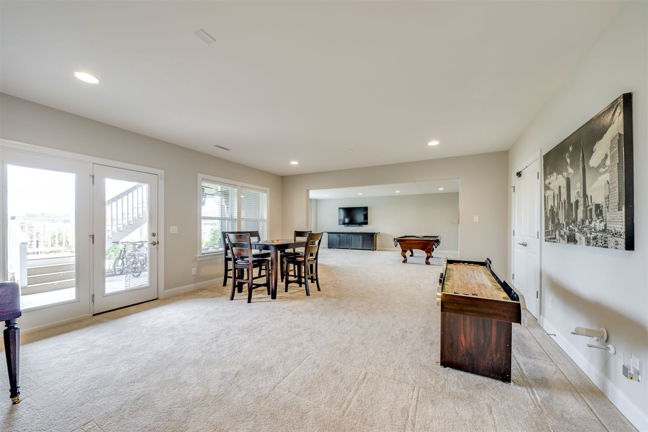 7504 Pinaster Place Raleigh, NC 27613 - Photo 23 of 30 Basement, endless possibilities in this amazing rec room! Rec Room