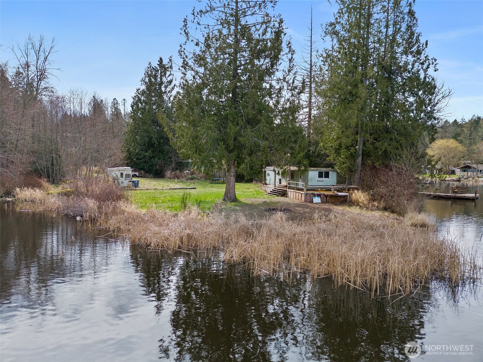 11903 State Game Road Eatonville, WA 98328 - Photo 6 of 24 a view of a lake with houses